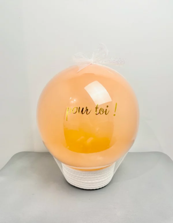 Un ballon orange à percer pour annoncer une grossesse